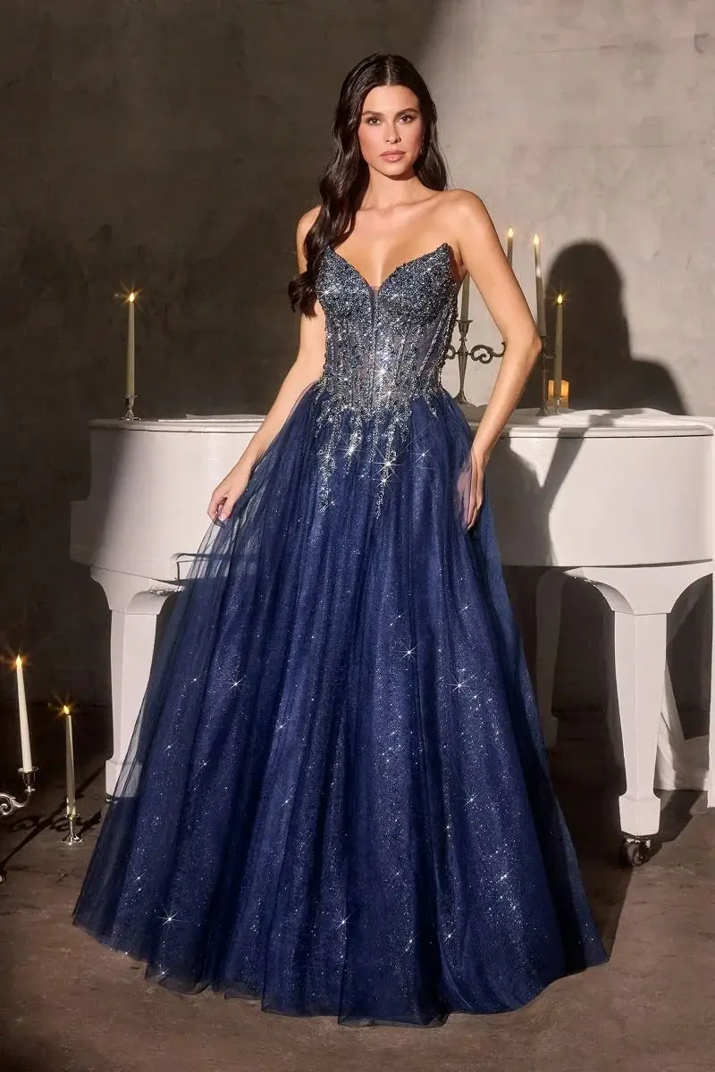 Thumbnail: navy prom dress beaded cat eye neckline corset top with a Basque waist and whimsical tulle skirt