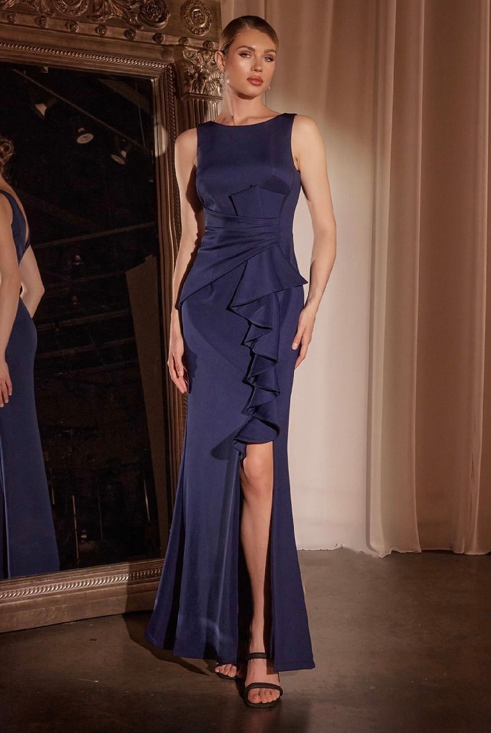 Thumbnail: navy High neck neoprene fitted gown with a cascading ruffle over the slit and pleated waist
