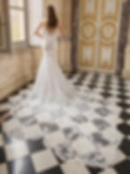 back view fitted lace wedding dress with beaded straps, low illusion back and long 2-tier lace train with scalloped edge