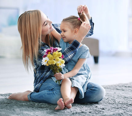 woman and girl on carpet
