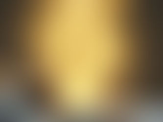 A woman sleeps in bed while a glowing golden figure emanates above, symbolizing her embodying her excellent self during sleep. Dark room, peaceful atmosphere.