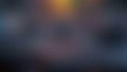 Traffic jam at sunset with cars on a highway. A dashboard displays "Relax" in glowing text. Palm trees and mountains in the background.