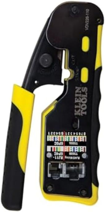 Crimping tool with yellow and black accents. Klein Tools logo visible. Display shows wiring guides. Set against a white background.