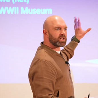 Sam Edwards giving a public talk