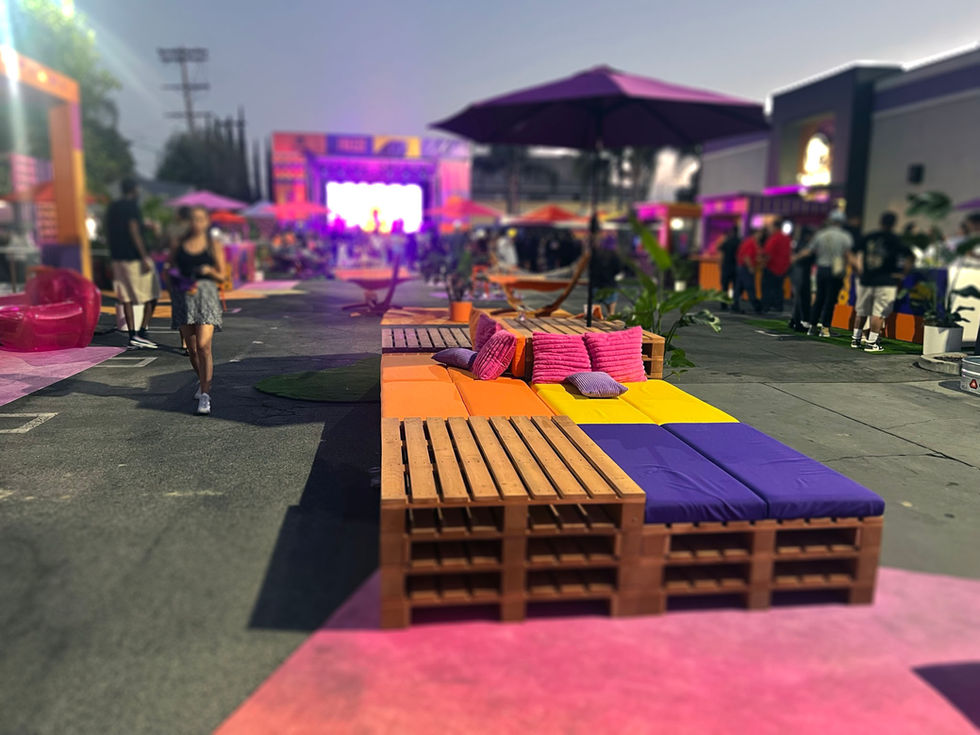 Larger-than-life stage banners featuring bold graphics and Taco Bell branding, creating a dynamic focal point and energizing the event space.