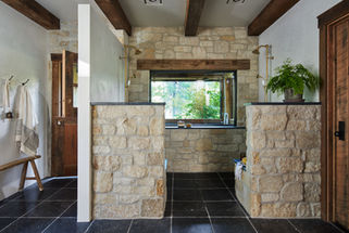 dutch door, wood door, rustic door, stone shower, stone bathroom, window in shower, basalt tile, wood beams, rustic bathroom, country bathroom