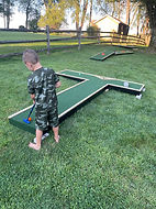 putting on mini golf 