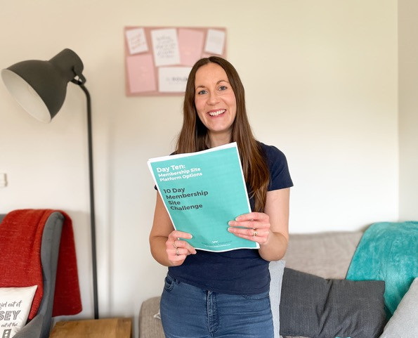 Image shows Jude holding up details of her website challenge