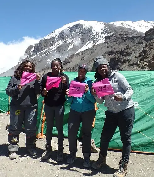Dare-Divas-in-front-of-tents.webp