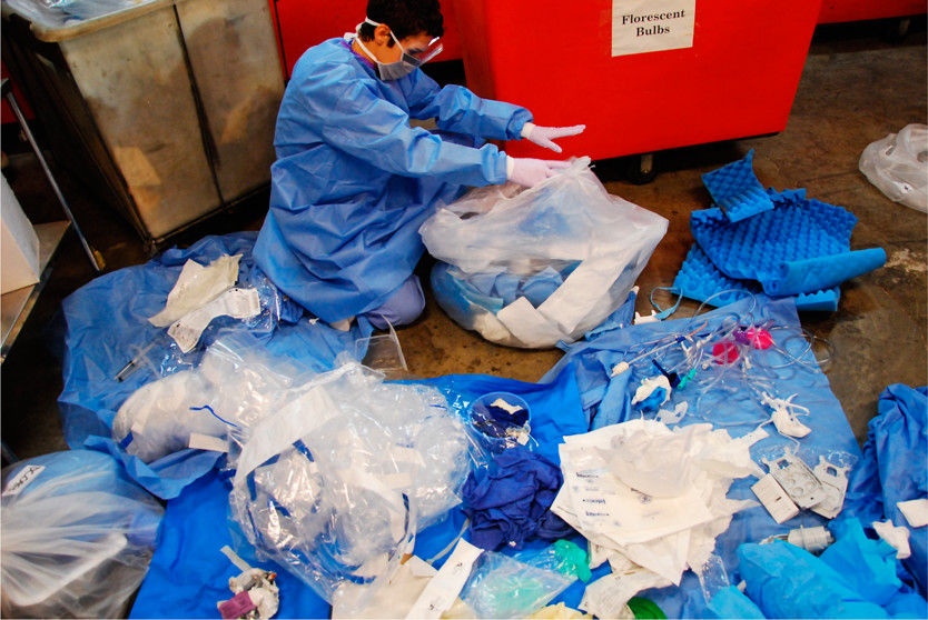 solid waste from a surgery being disposed of