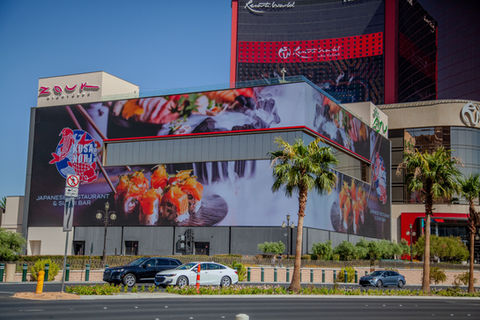Building with large digital sushi ad, Japanese Restaurant & Bar