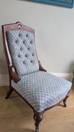 Antique armchair reupholstered with deep-buttoning in Linwood Ashfield II