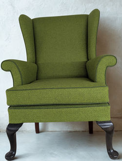 Parker Knoll armchair in Abraham Moon Parquet wool