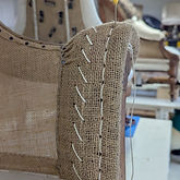 Traditional stitched arm