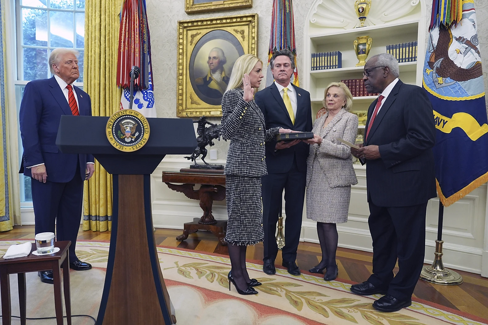 Pam Bondi is sworn in as Attorney General by Supreme Court Associate Justice Clarence Thomas in the Oval Office of the White House on Wednesday, February 5, 2025, in Washington, as President Donald Trump, her partner John Wakefield, and her mother Patsy Bondi look on. (AP Photo/Evan Vucci)