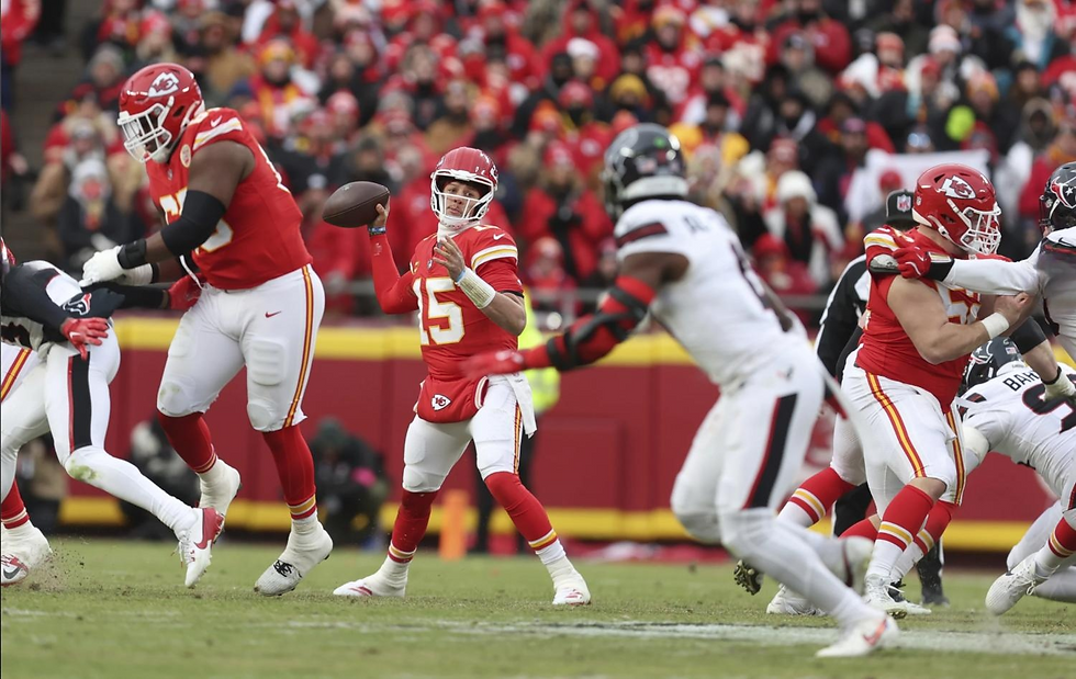 Kansas City Chiefs quarterback Patrick Mahomes (15) throws during the first half of the AFC divisional playoff game against the Houston Texans on Saturday, Jan. 18, 2025, in Kansas City, Mo. (AP Photo/Travis Heying)