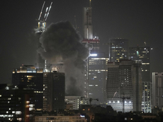 Air raid sirens have sounded across Israel and interceptions were visible overhead in Tel Aviv following an Iranian missile attack on the country. There were no immediate reports of casualties.