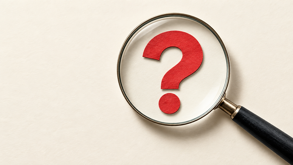 A magnifying glass examines a red paper question mark, illustrating the testing of a marketing claim.
