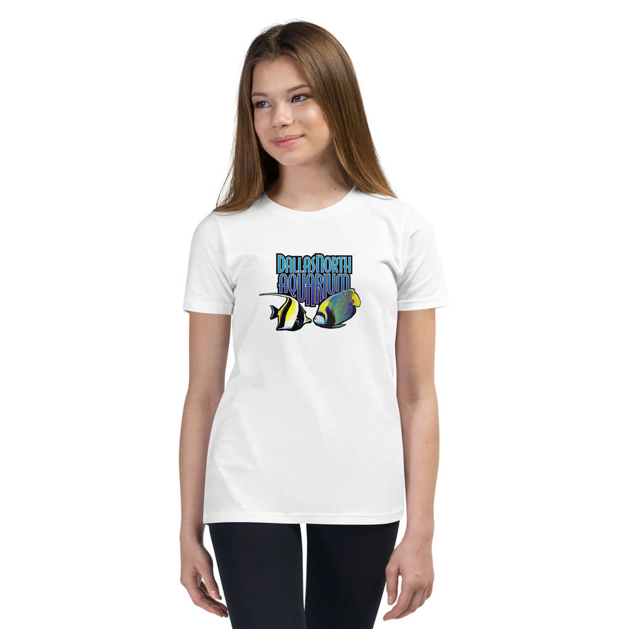 Girl wearing a white Youth Short Sleeve T-Shirt with Dallas North Aquarium logo and fish design
