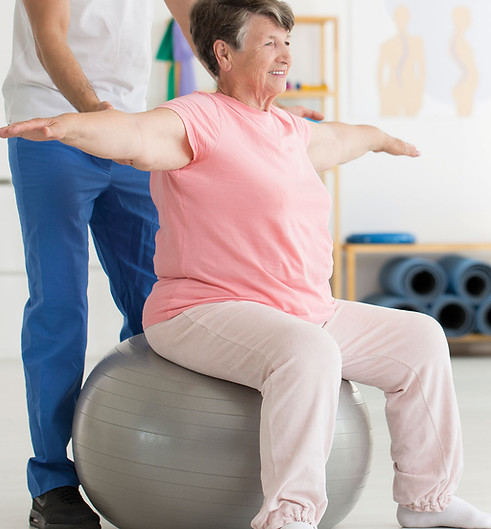 Qualified practitioner helping patient one on one