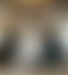 This photo shows a woman getting her dress fitted.