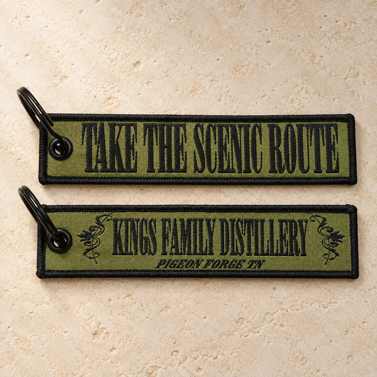 Custom fabric keychains showing front and back artwork