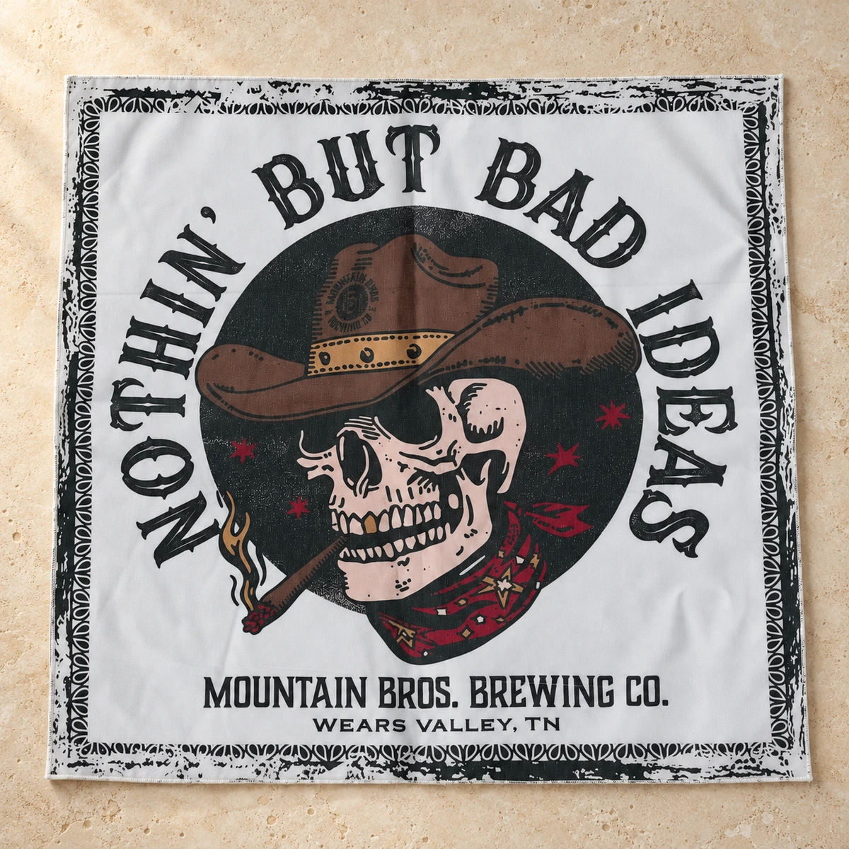 Custom bandana laid flat to show its printed artwork