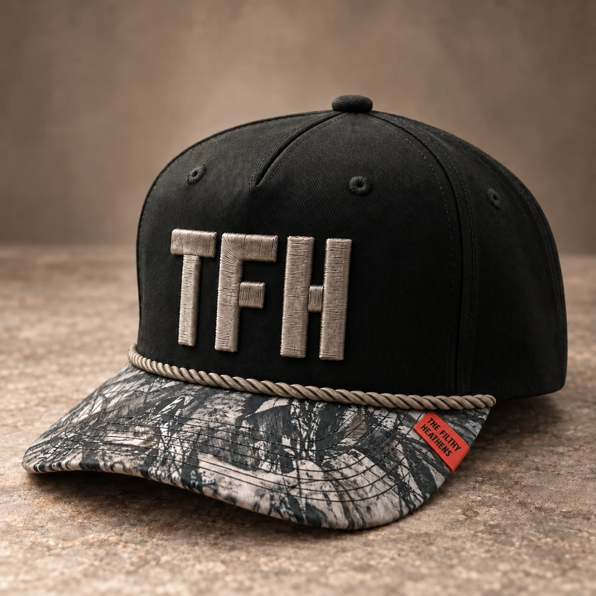 Dark custom hat with 3D puff embroidery, camouflage brim and narrow red tag