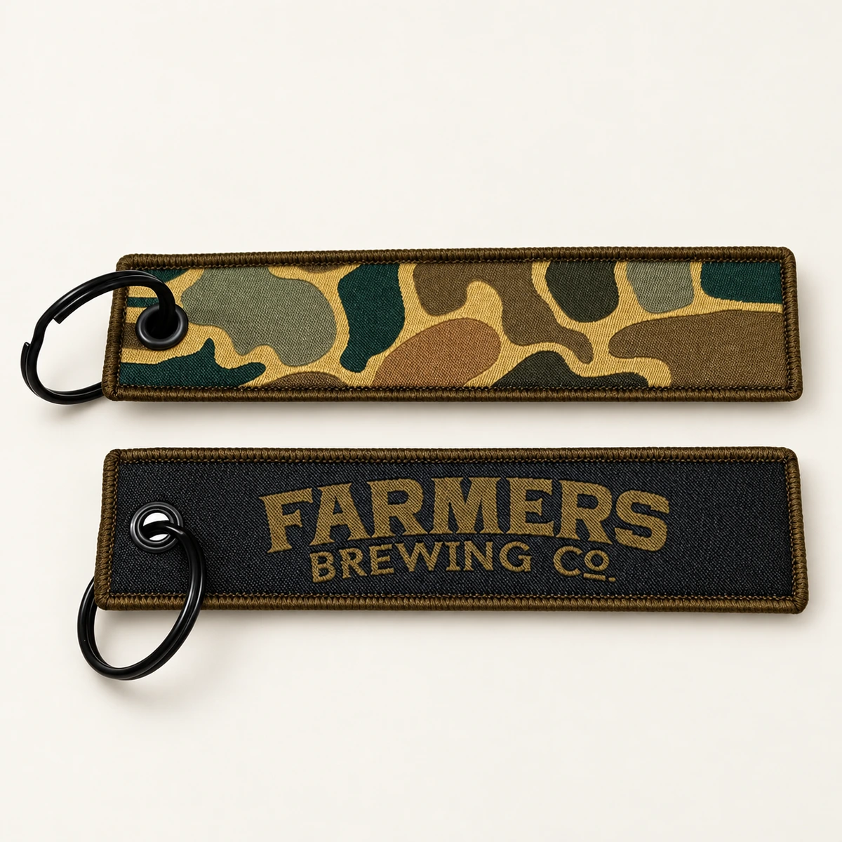 Custom fabric keychains showing front and back artwork