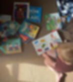 Child picking out a sticker bandaid to put on an injured character.