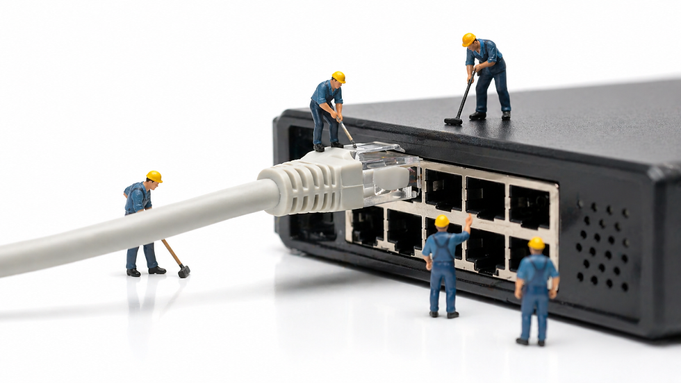 Technicians servicing a network switch representing managed IT services for small businesses