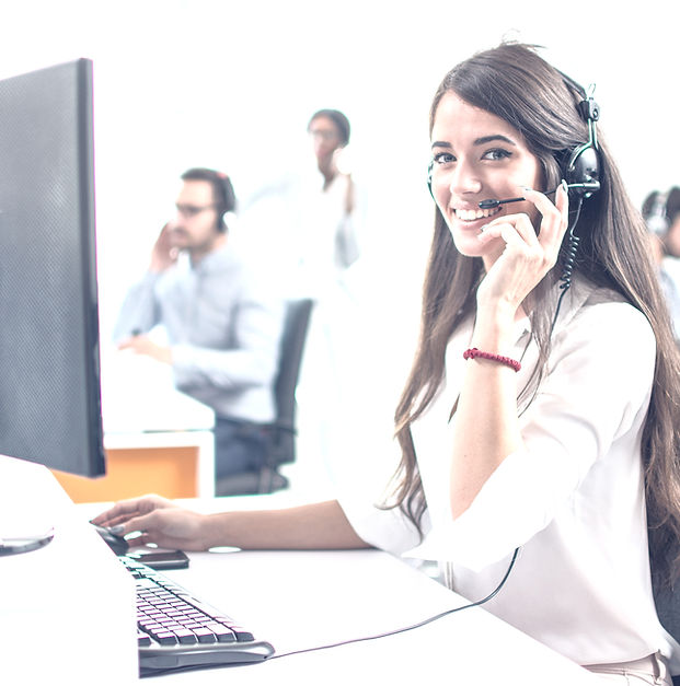 Young friendly operator woman agent with headsets working in a call centre._edited.jpg