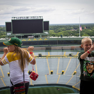Lambeau Field tour green bay kid taking photo