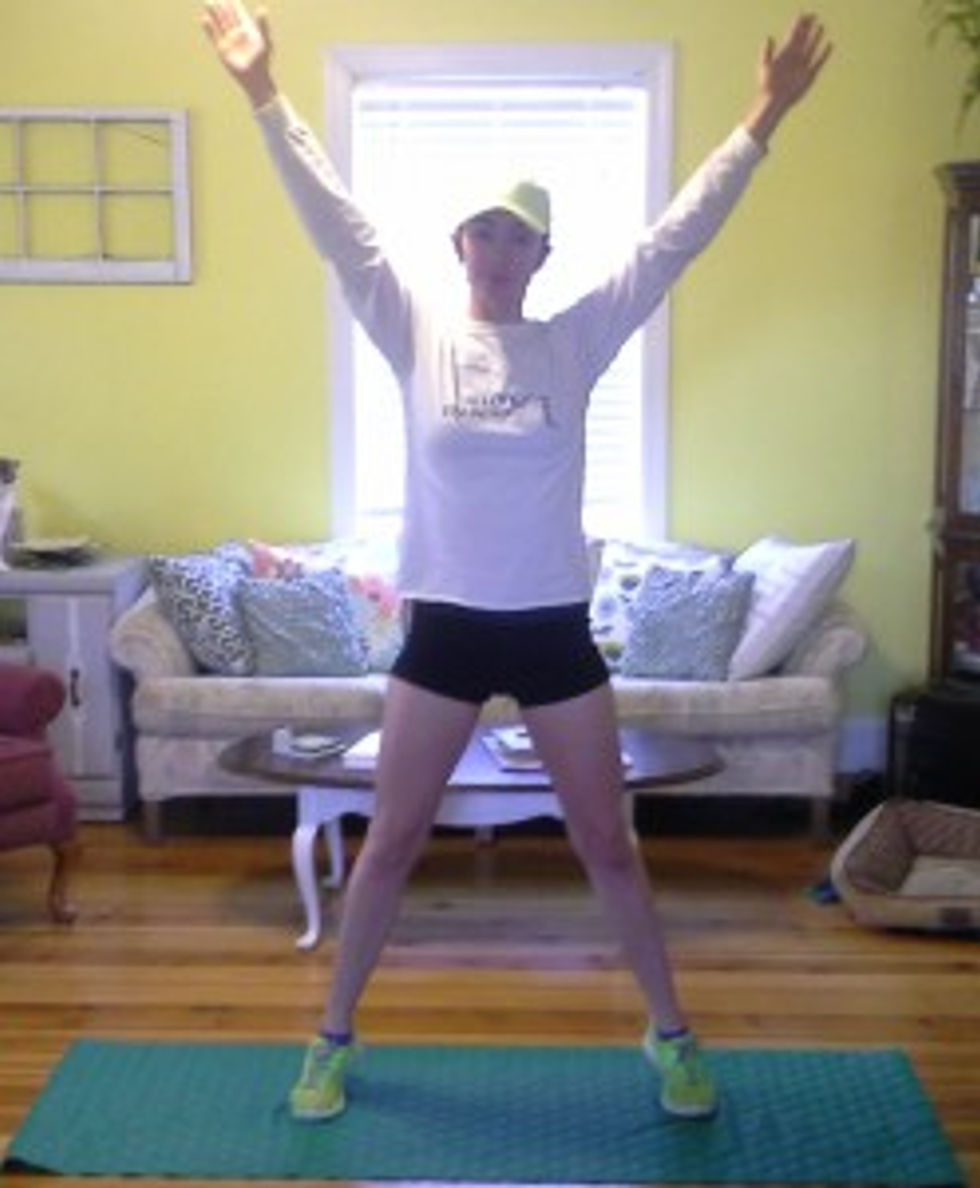 Jump or step into a wide leg position with your arms spread above your head. For added benefit, focus on pulling your legs together when you return to start.