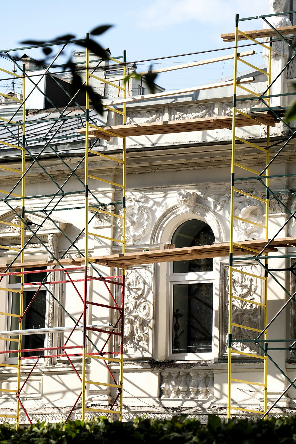 NYC contractor assessing building façade for capital improvement work