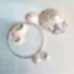 Ladies Silver bangle with sea shell limpet charms by rock rose jewellery