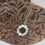 Thumbnail: silver pendant necklace in circular shape, circle is a row of 10 forget-me-not flowers, by rock rose jewellery