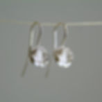 silver rose bud drop earrings by rock rose jewellery