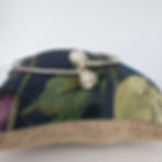 sterling silver rosebud bangle with 2 flowers twisted together at top, by rock rose jewellery