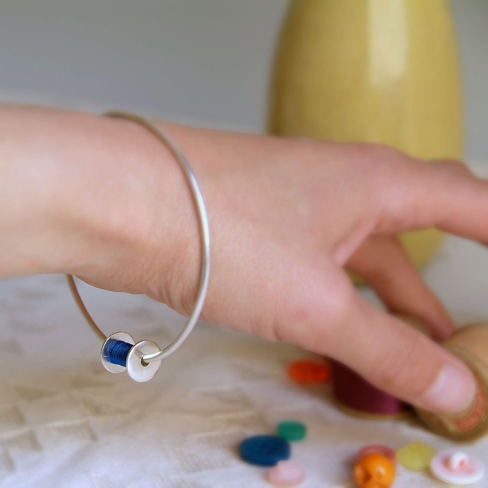 Thumbnail: Silver Sewing Reel Bangle by rock rose jewellery