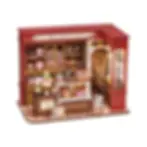 completed view of honey dessert diy miniature kit by robotime with sweets, chocolate, macarons, cake and display case