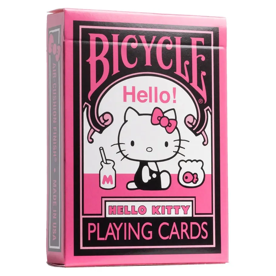 front of box of Hello Kitty black and pink bicycle playing cards showing hello kitty next to milk jug and fishbowl