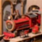 Close up view of the steam train and station in the book nook shelf insert kit