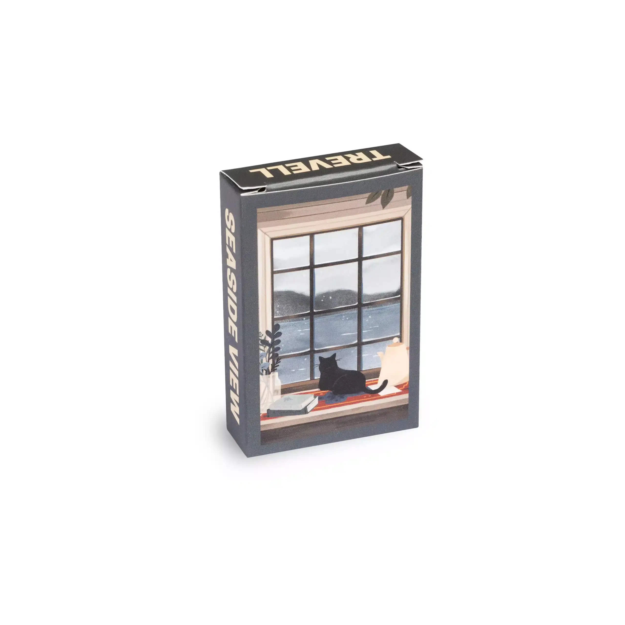 Box view of seaside view mini 99 piece puzzle with a black cat on a shelf with books looking out a window onto water