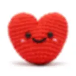 Completed Val the Heart woobles beginner crochet kit with a red heart with smiling face