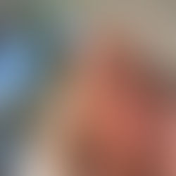 Blonde woman sitting outside 