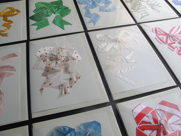 Greetings cards for every occassion and every colour arranged on a table. Easter. Christmas. Anniversary.
