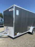 Barn doors, mag wheels, working lights, 2” ball, 4-pin wiring, 6’6” height, sloped nose – ready to haul! 