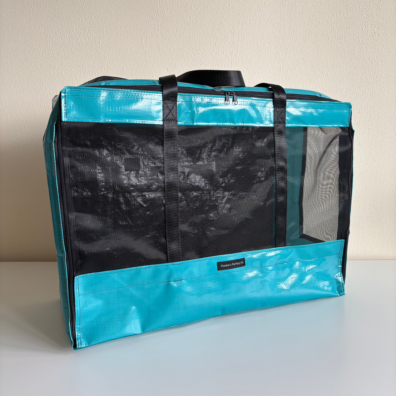 Carry Me Lightly 2.0 – Leichte Flugtasche 238 g. Petrol mit neuem Gitter.