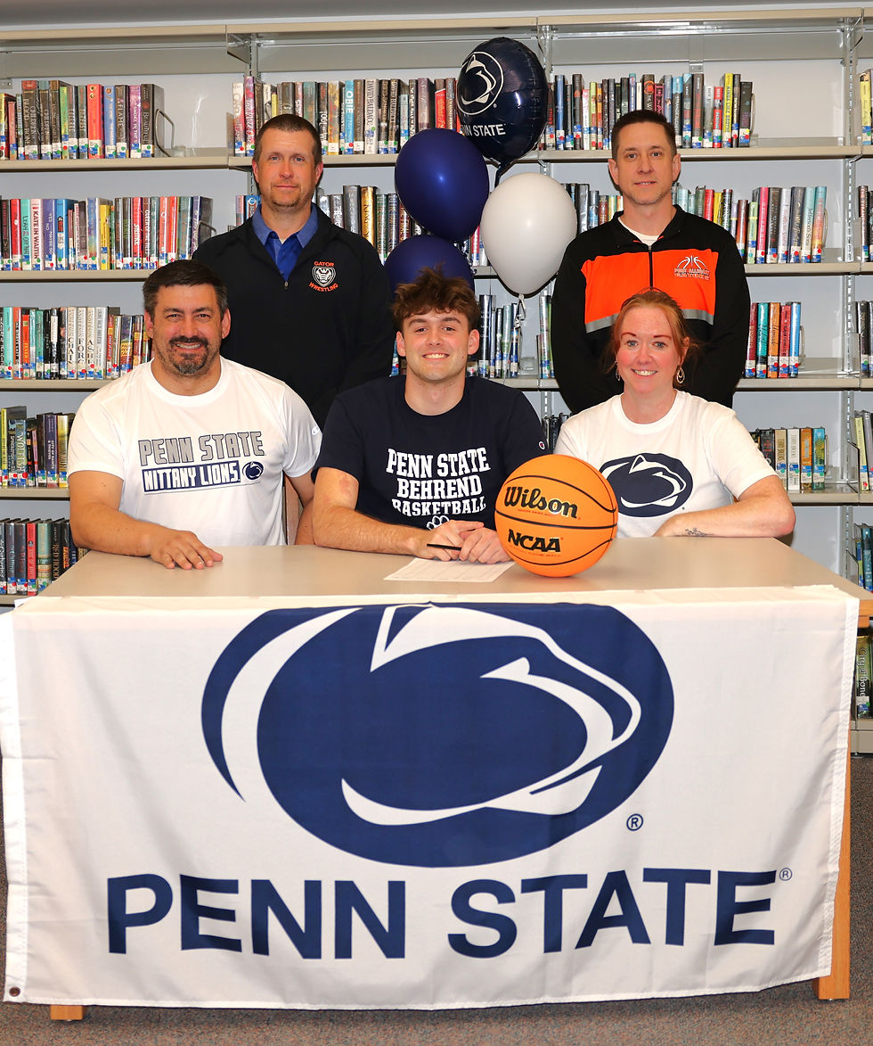 Funk is pictured with his parents Dan and Jennifer Funk, Athletic Director Aaron Clark and head basketball coach Kyle Babcock.